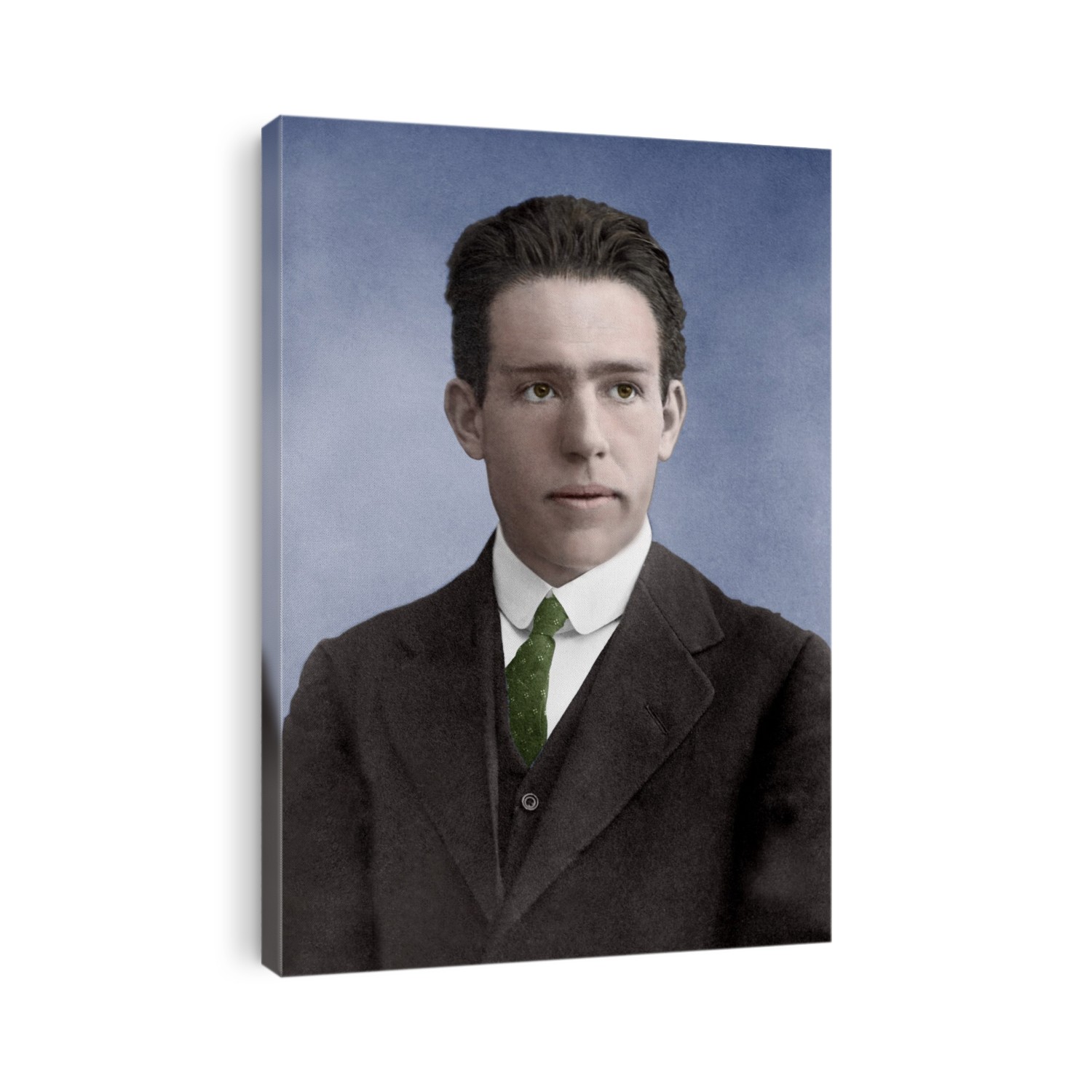 Niels Bohr (1885-1962), Danish physicist and Nobel laureate. Bohr made numerous contributions to physics during his career, but it was his work on the structure of atoms that won him the 1922 Nobel Prize. Following Ernest Rutherford's discovery of the nucleus, Bohr described the atom as a small, positively charged nucleus surrounded by waves of electrons with discrete (quantised) energies. Though associated with the Manhattan Project in World War II, he dedicated his later life to peaceful applications of atomic physics.