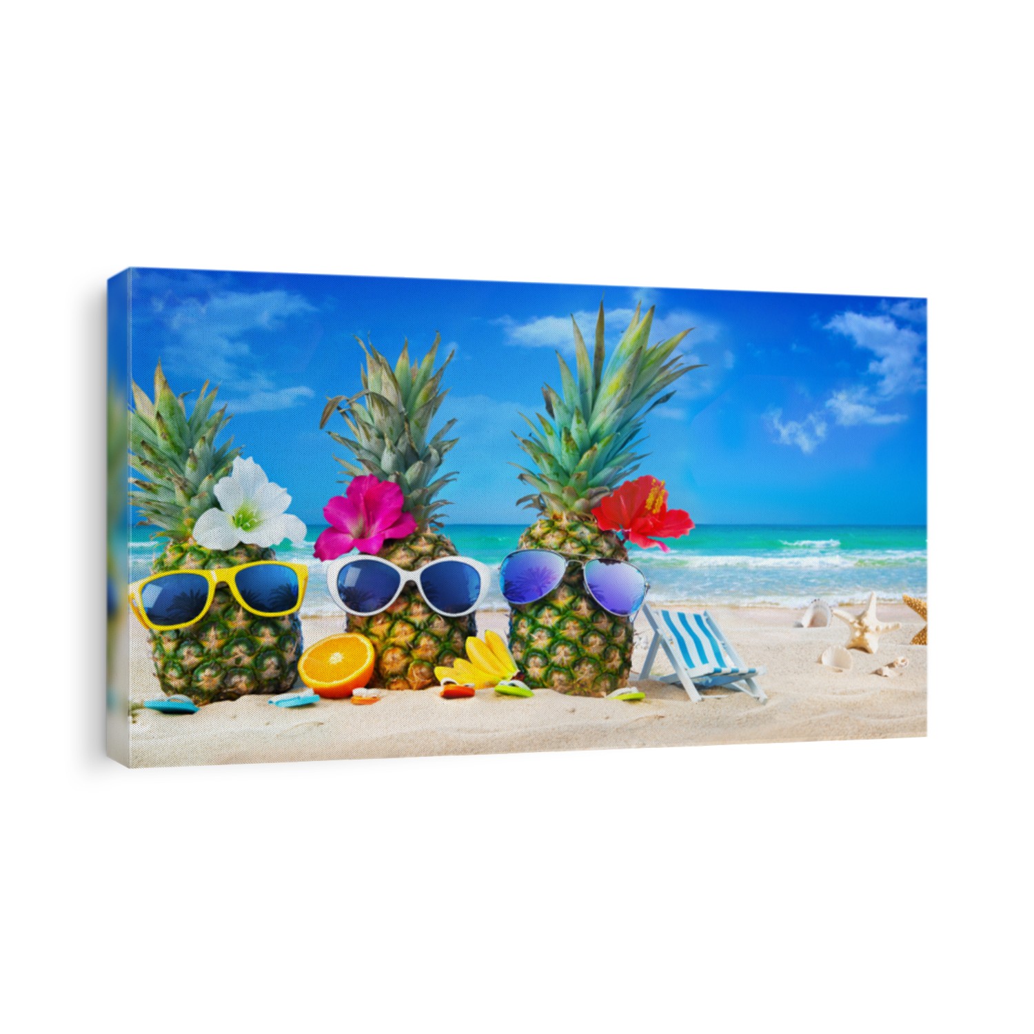 Attractive pineapples in stylish sunglasses on the sand beach against turquoise sea. Tropical summer vacation concept